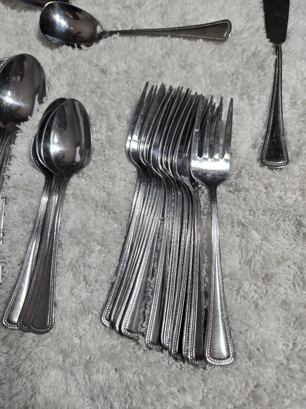 Oneida needlepoint flatware several Items used flatware